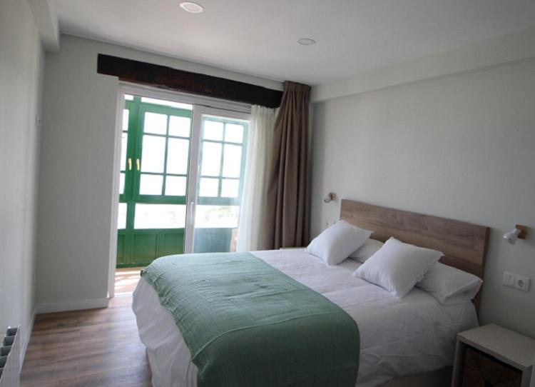 Apartamentos El Muelle Comillas Luaran gambar